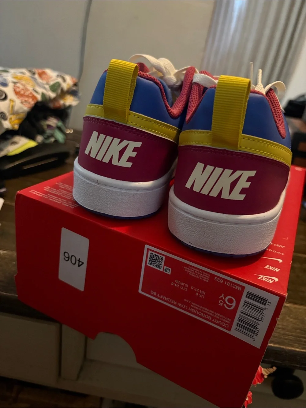 Nike Kids Low-Top Sneakers in Pink, Blue & Yellow